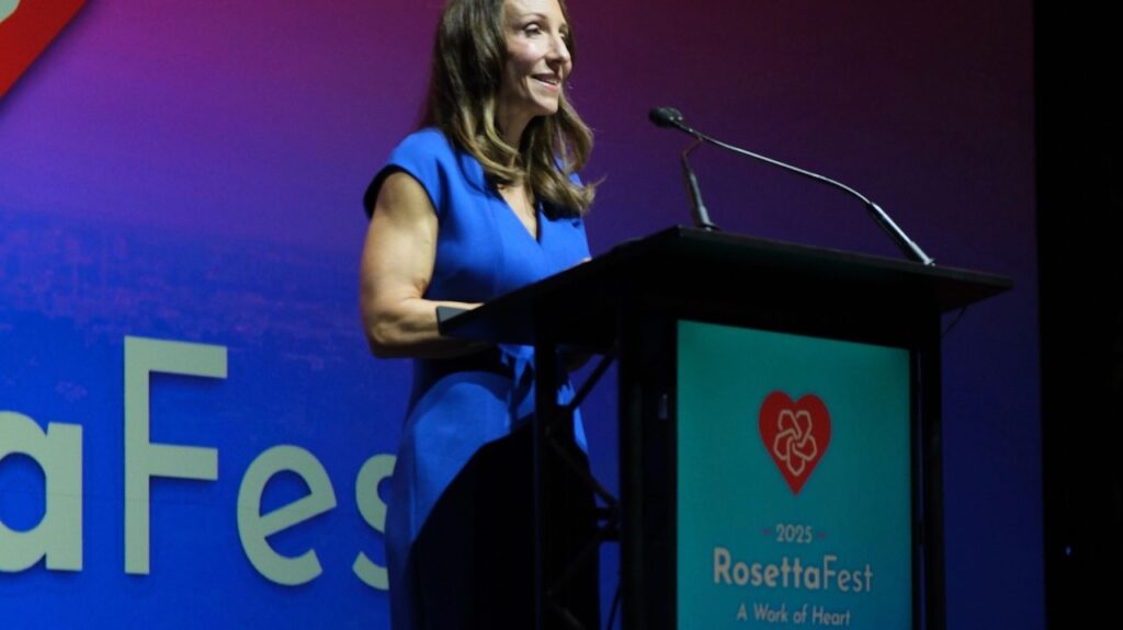 Chris Deacon speaking at a podium
